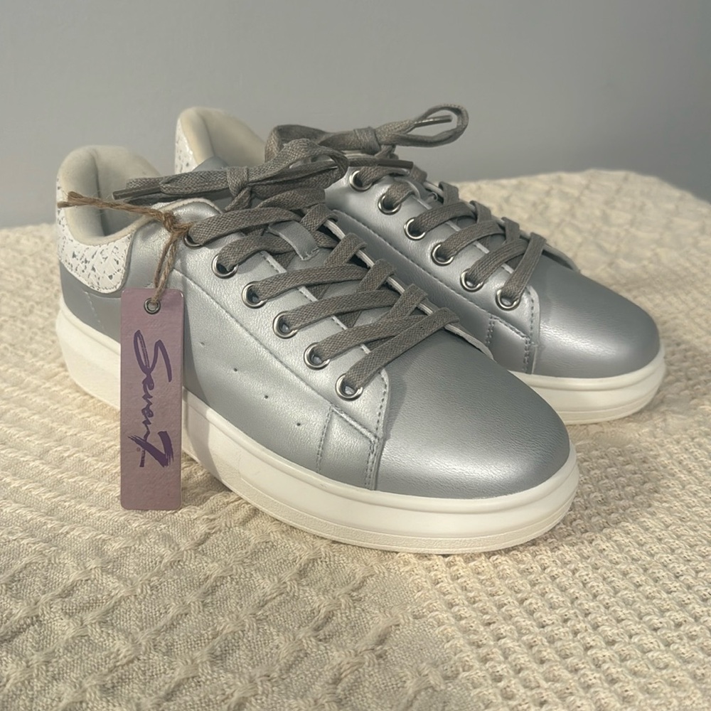 Seven silver women’s shoes